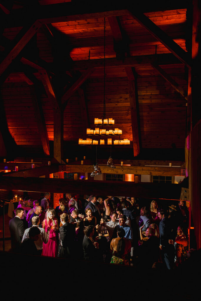 A dance floor is full of wedding guests inside the lodge at Gorrono Ranch in Telluride.