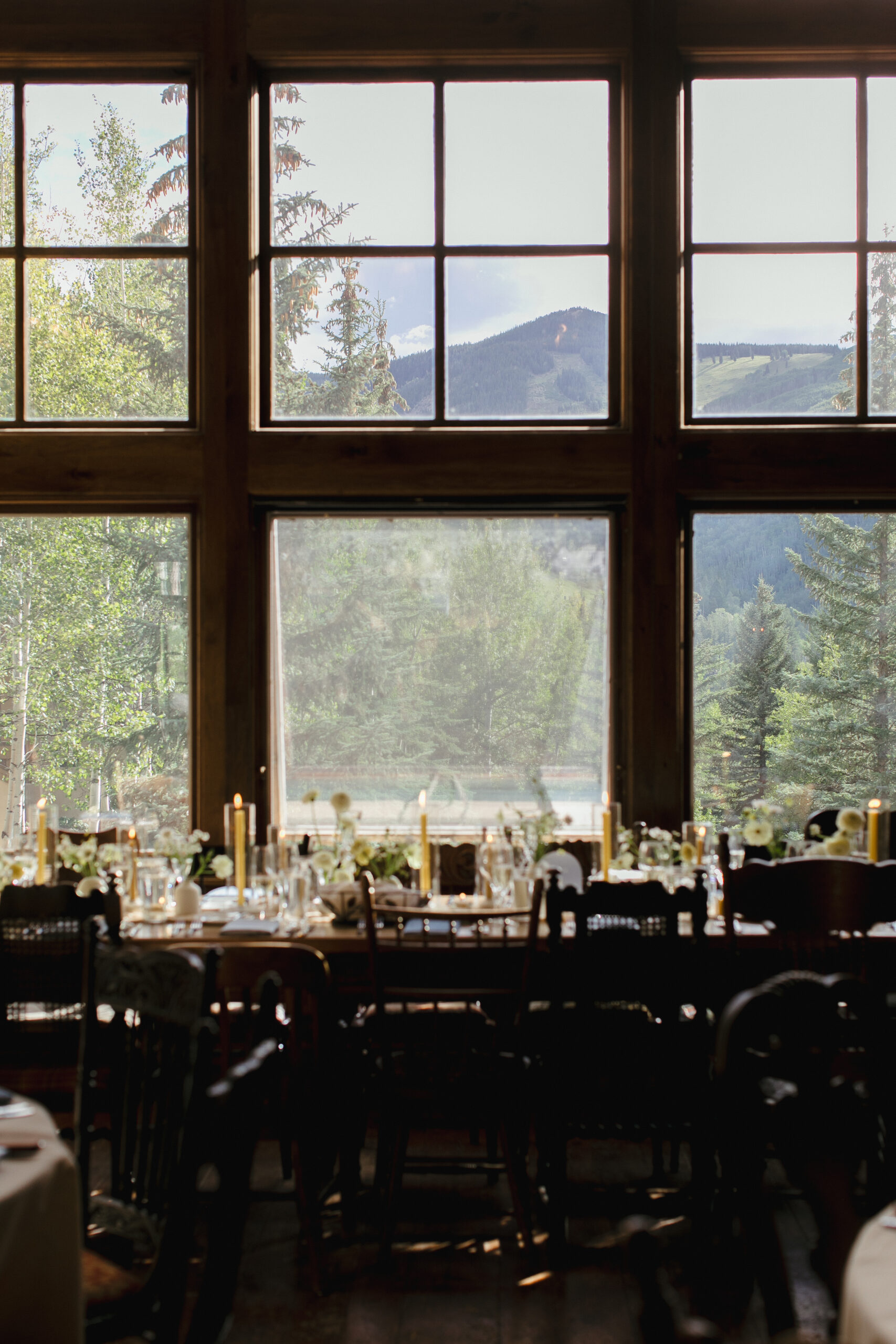 The view of ski runs at Beaver Creek Resort from inside Saddleridge wedding venue.